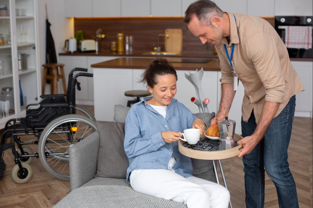 SIL Accommodation in WA 02   Blisscare staff serving the disabled woman